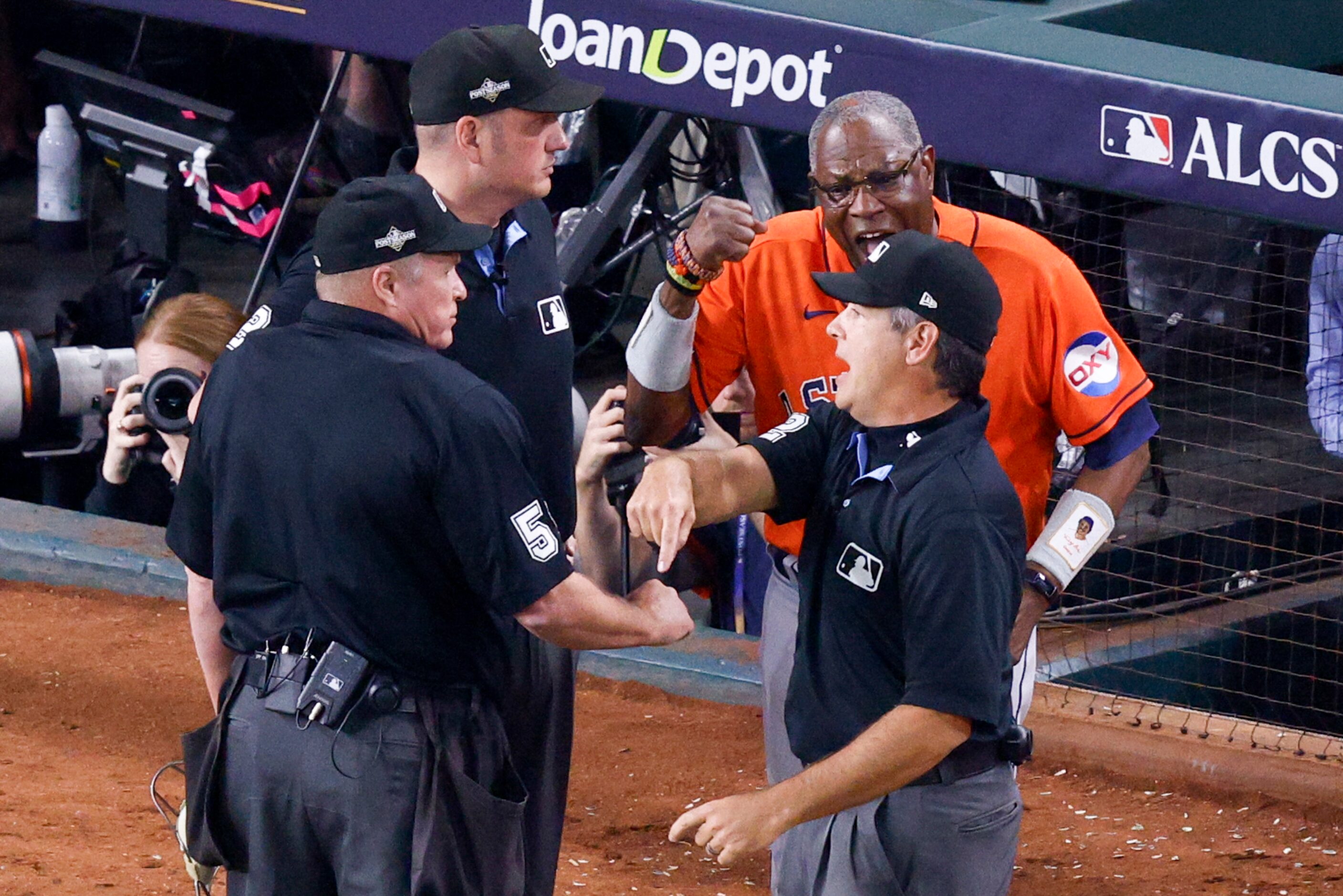 Umpire Dan Bellino (2) ejects Houston Astros manager Dusty Baker Jr. after arguing the...