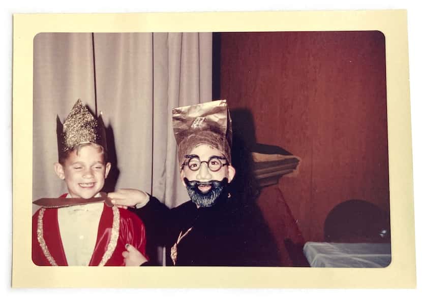 A smiling Rodney Gappelberg (left) is threatened with a cardboard knife by a masked...