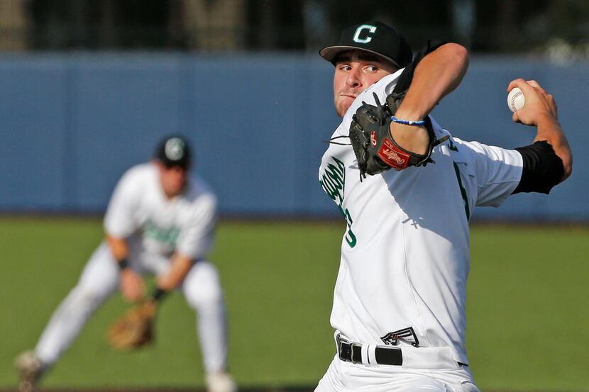 Southlake Carroll starting pitcher Nicco Cole delivers a pitch in the seventh inning during...