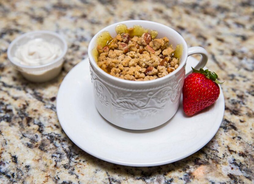 
Peach cobbler with granola crumble is among the dishes the Hugs Café teammates have been...