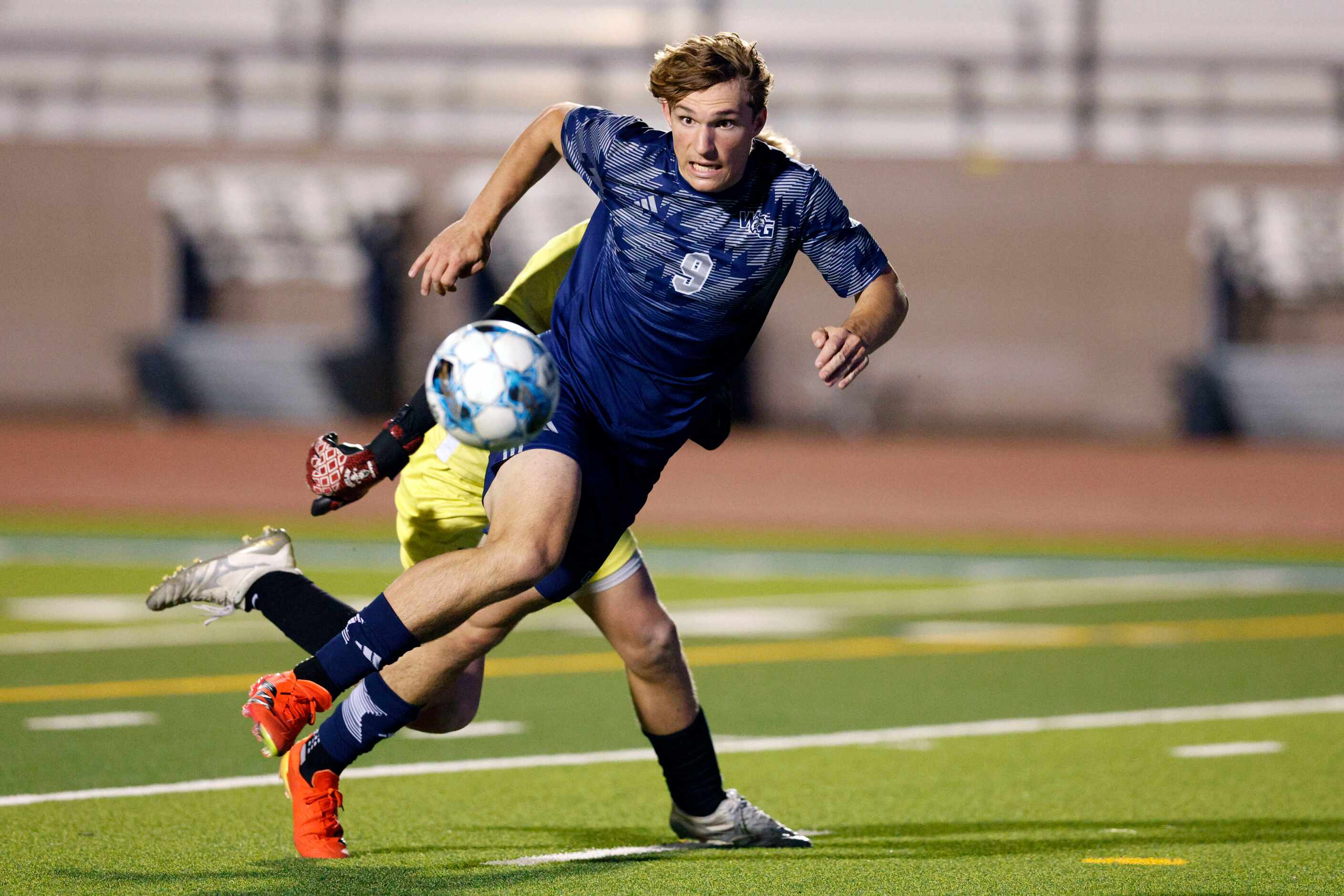 Frisco Reedy goalkeeper Mason Miller (0) fouls Prosper Walnut Grove forward Ryan Anderson...