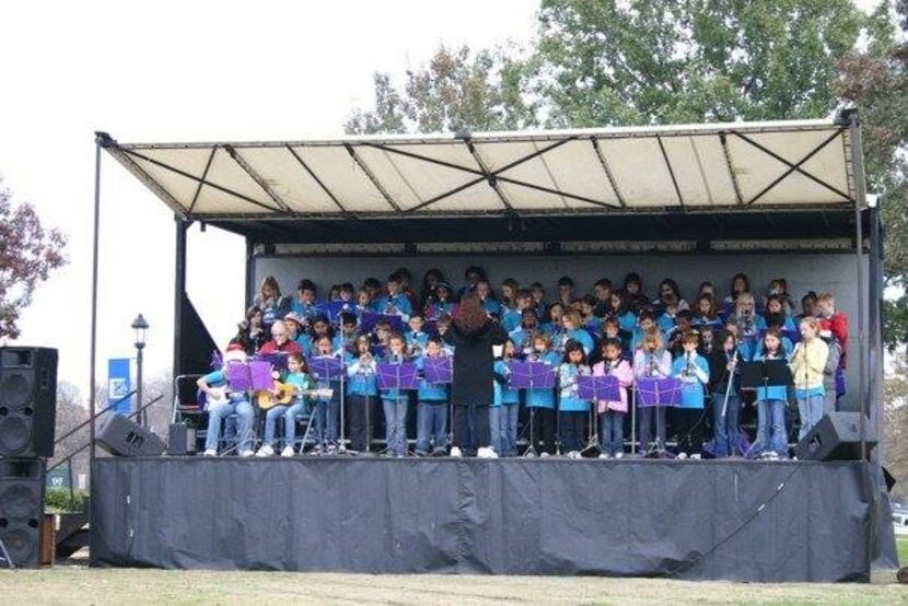 The Prairie Trail Elementary School STARS perform as part of the tree lighting festivities...