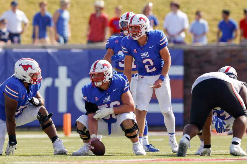 SMU quarterback Preston Stone (2) yells to his teammates during the second half of an NCAA...