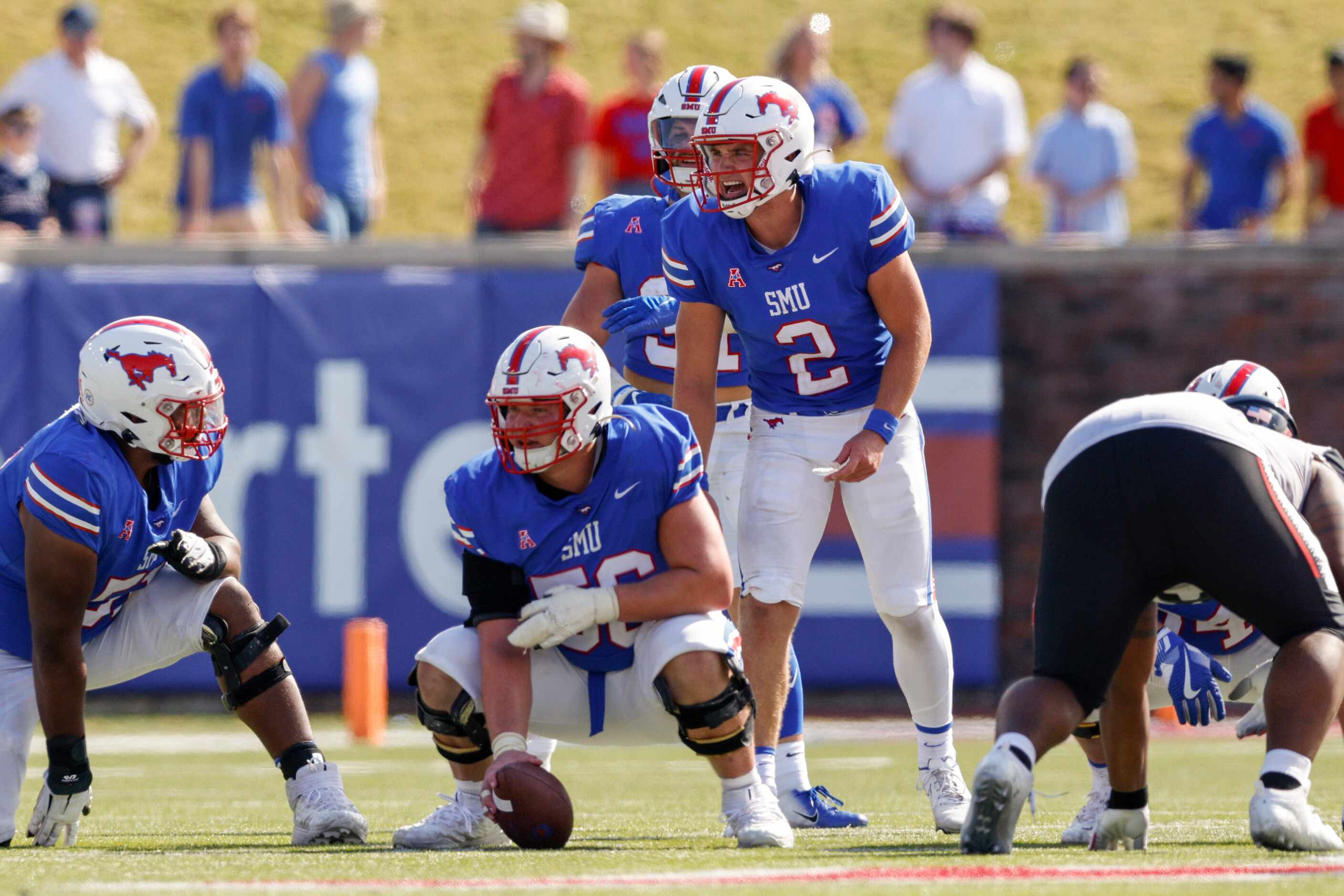 SMU quarterback Preston Stone (2) yells to his teammates during the second half of an NCAA...