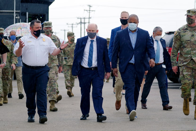 Dallas Mayor Eric Johnson (right) toured Dallas County's Community Vaccination Center at...