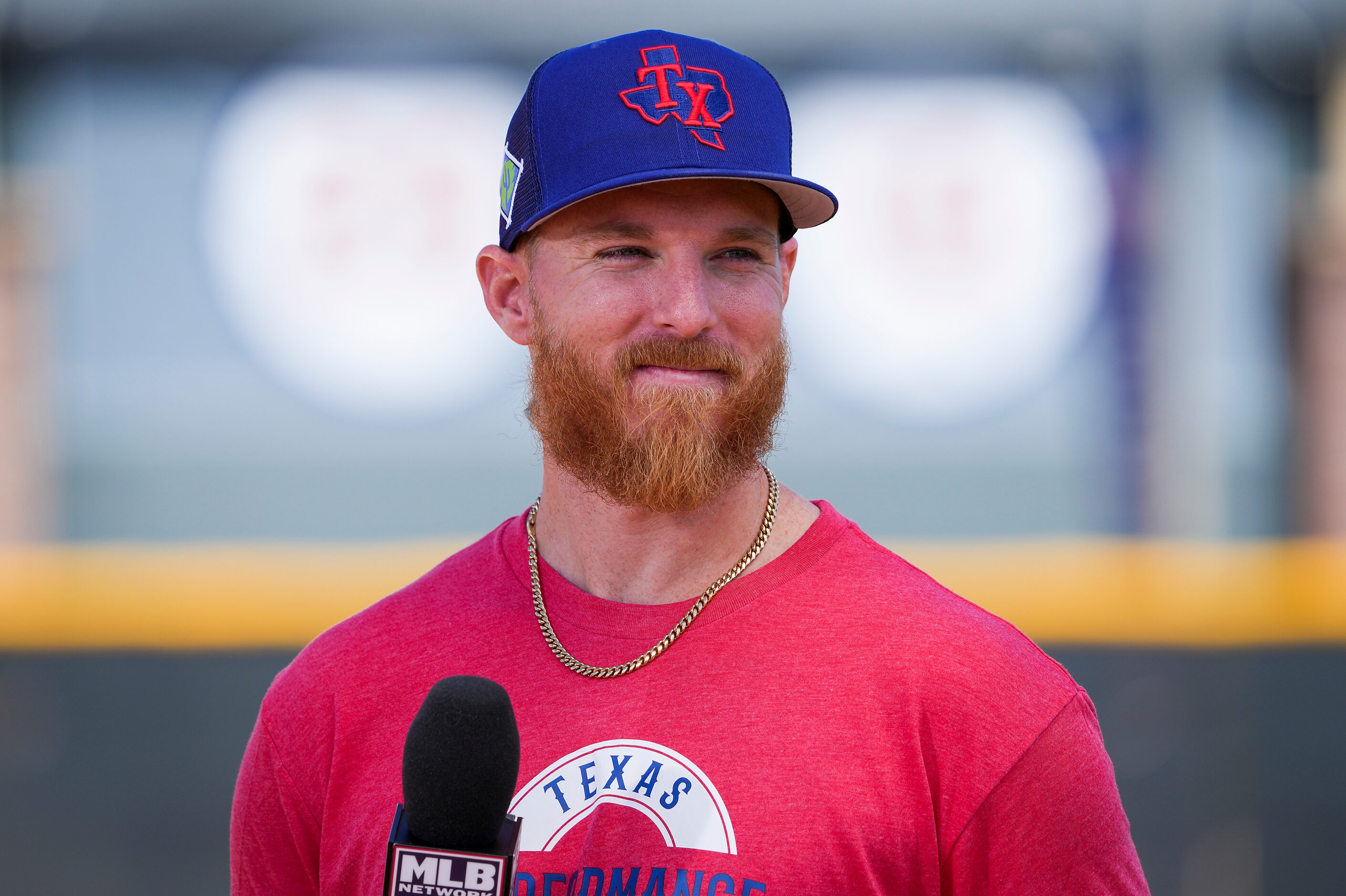 Texas Rangers pitcher Jon Gray does an interview with MLB TV after a spring training workout...