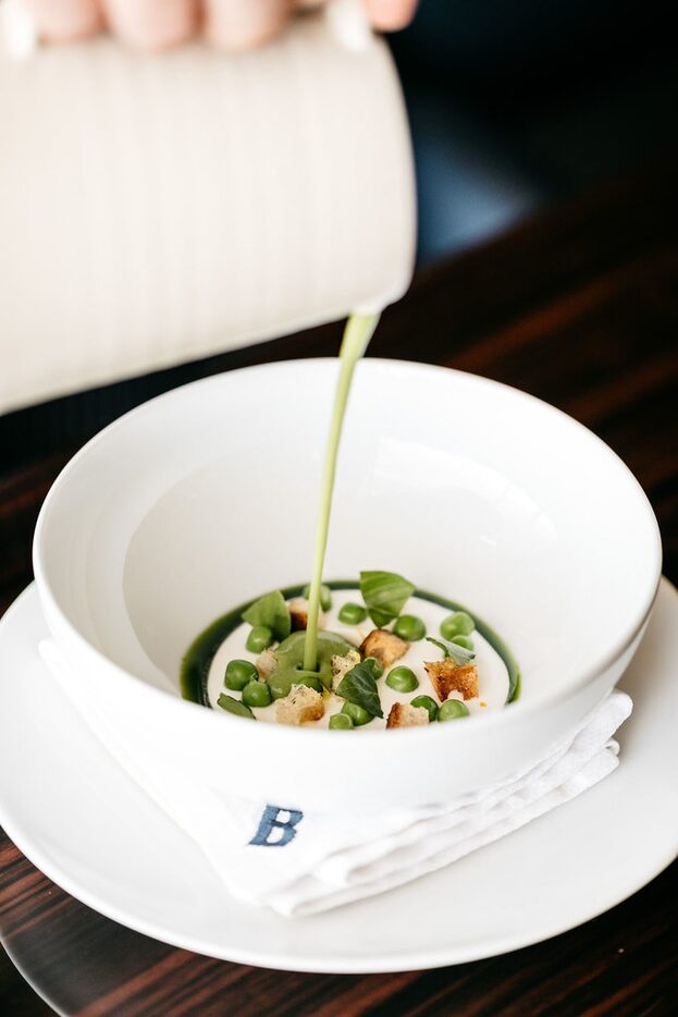 This spring English pea soup with yuzu cream, croutons and mint is part of Bullion's...