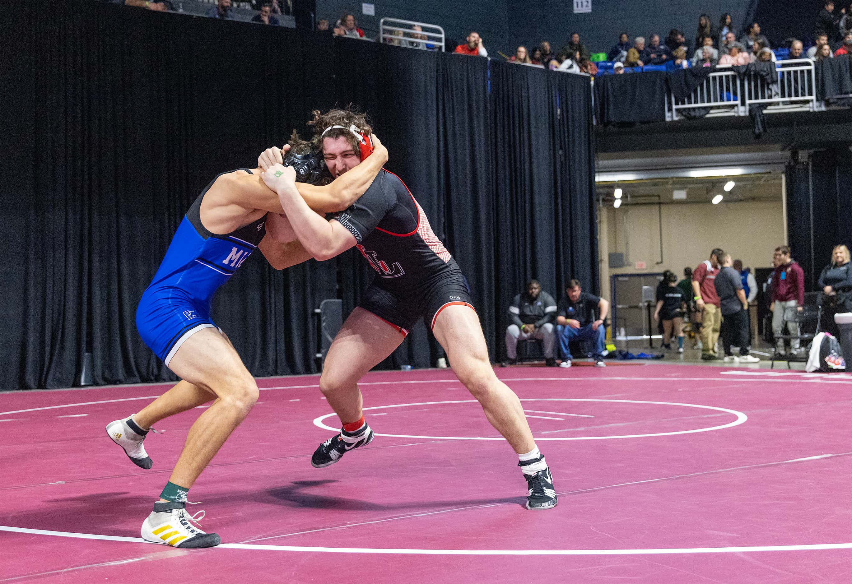 Payton Pierce from Lovejoy (right) wrestles Jack Ashley from Midlothian in the 5A boys 215...