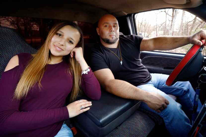 Country singer Kris Jones and his daughter Dayla pose together in the 1999 Dodge Ram pickup...