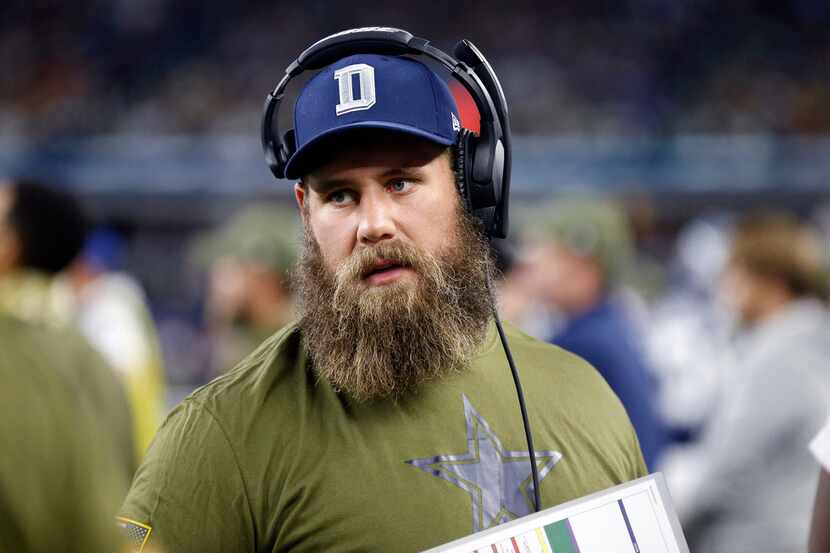 FILE - In this Nov. 5, 2018, file photo, Dallas Cowboys center Travis Frederick walks the...