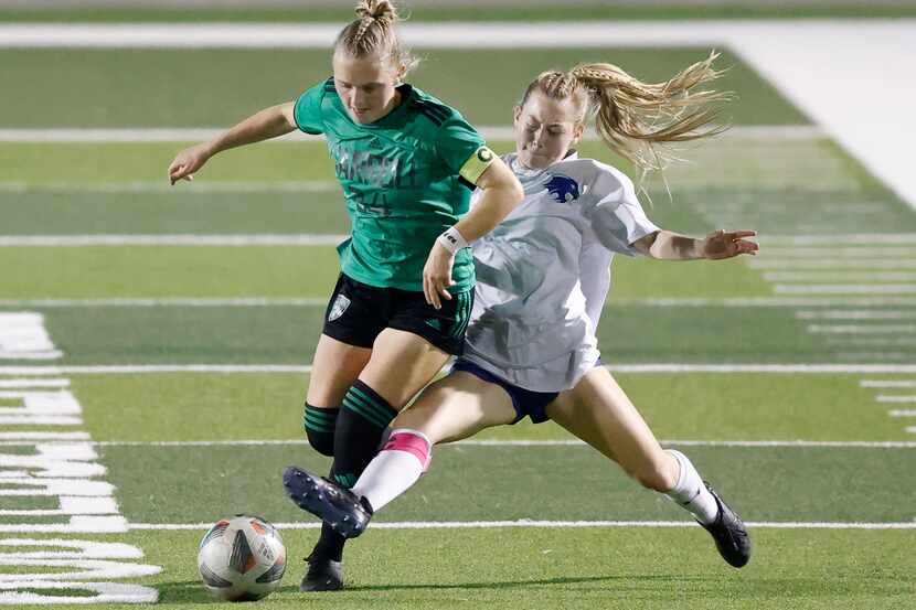 Trophy Club Byron Nelson’s Nadia Ortiz (12) makes a sliding tackle of Southlake Carroll...