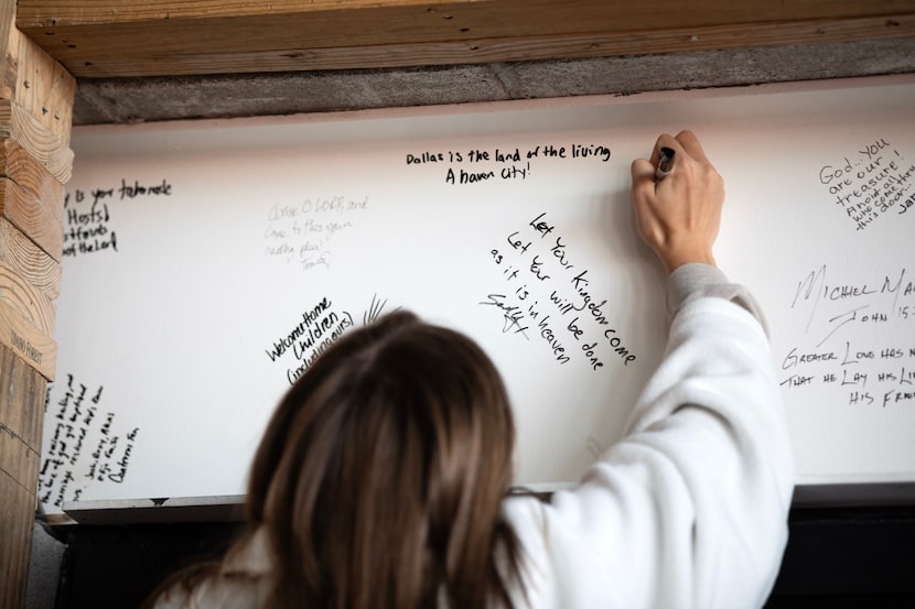 Upperroom church members wrote messages of hope during a beam signing in November.