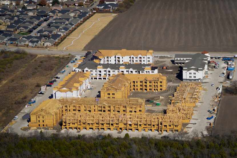 This aerial view shows construction of The Royalton at Grand Prairie Luxury Apartment...