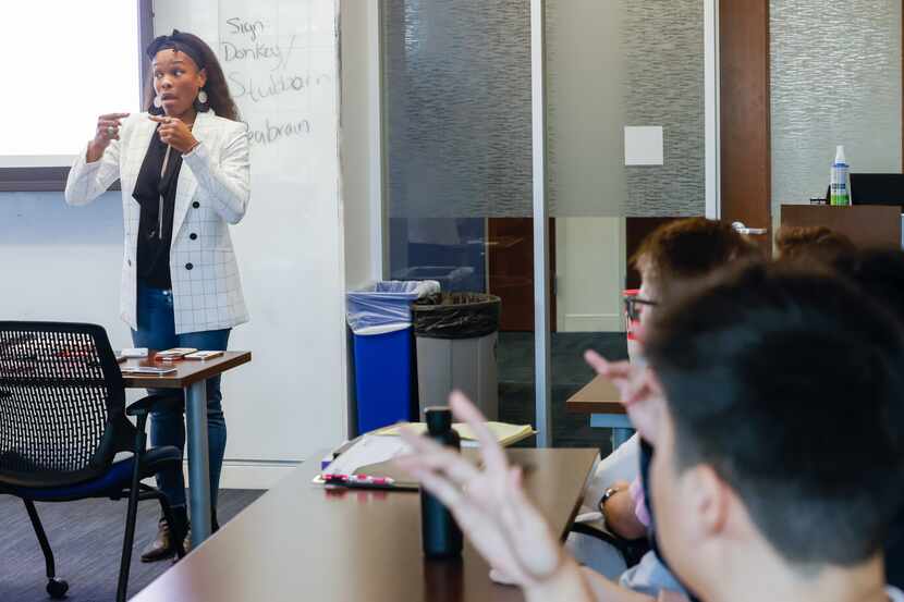 Tiffany McCray (left) teaches American Sign Language at the Southern Methodist University....