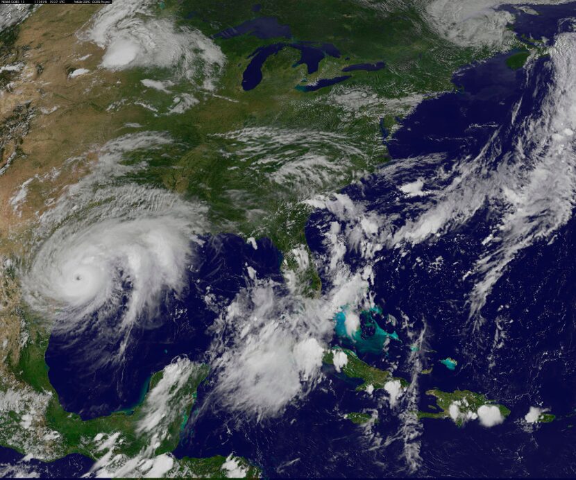 This enhanced satellite image made available by the NOAA GOES Project shows Hurricane Harvey...