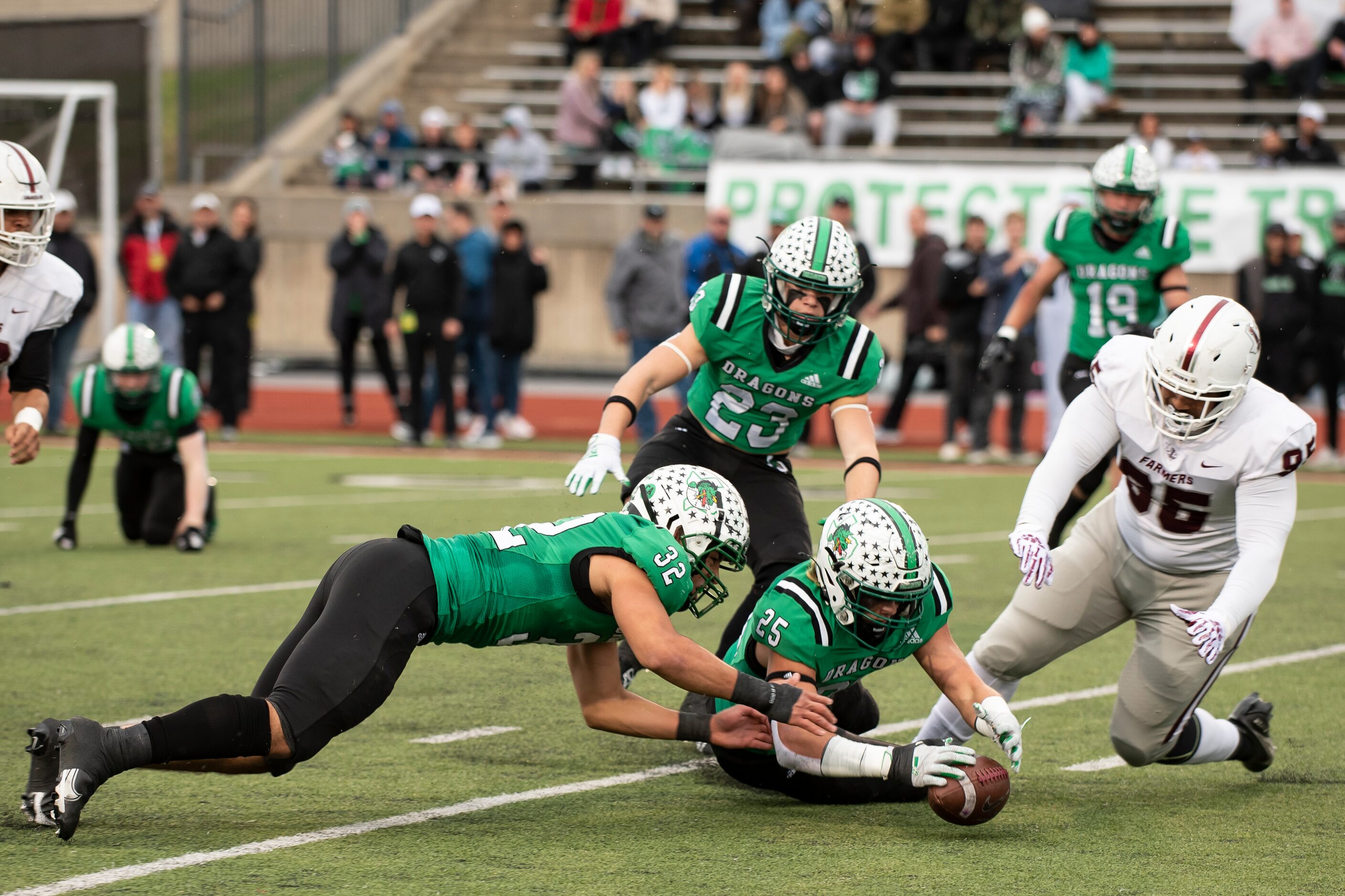 From left, Southlake Carroll senior Benecio Porras (32), senior Barrett Baker (25) and...