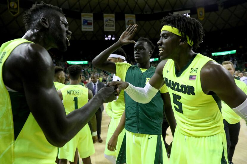 WACO, TX - JANUARY 04:  Johnathan Motley #5 of the Baylor Bears and Jo Lual-Acuil Jr. #0 of...