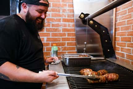 Pitmaster Manuel Zarate grills Texas Twinkies at the Original Roy Hutchins Barbeque in...
