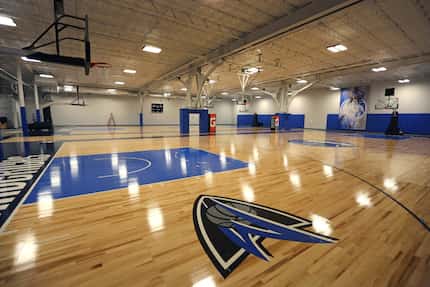 Two basketball courts stand at the ready at the Dallas Mavericks' new practice facility,...