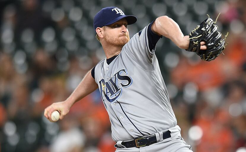 FILE - In this Sept. 22, 2017, file photo, Tampa Bay Rays pitcher Alex Cobb throws against...