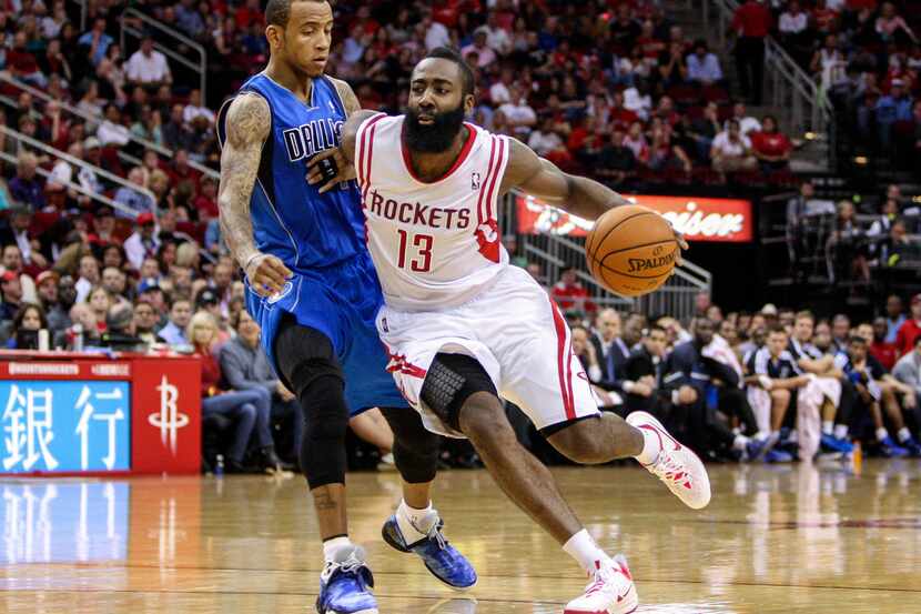 Nov 1, 2013; Houston, TX, USA; Houston Rockets shooting guard James Harden (13) drives the...