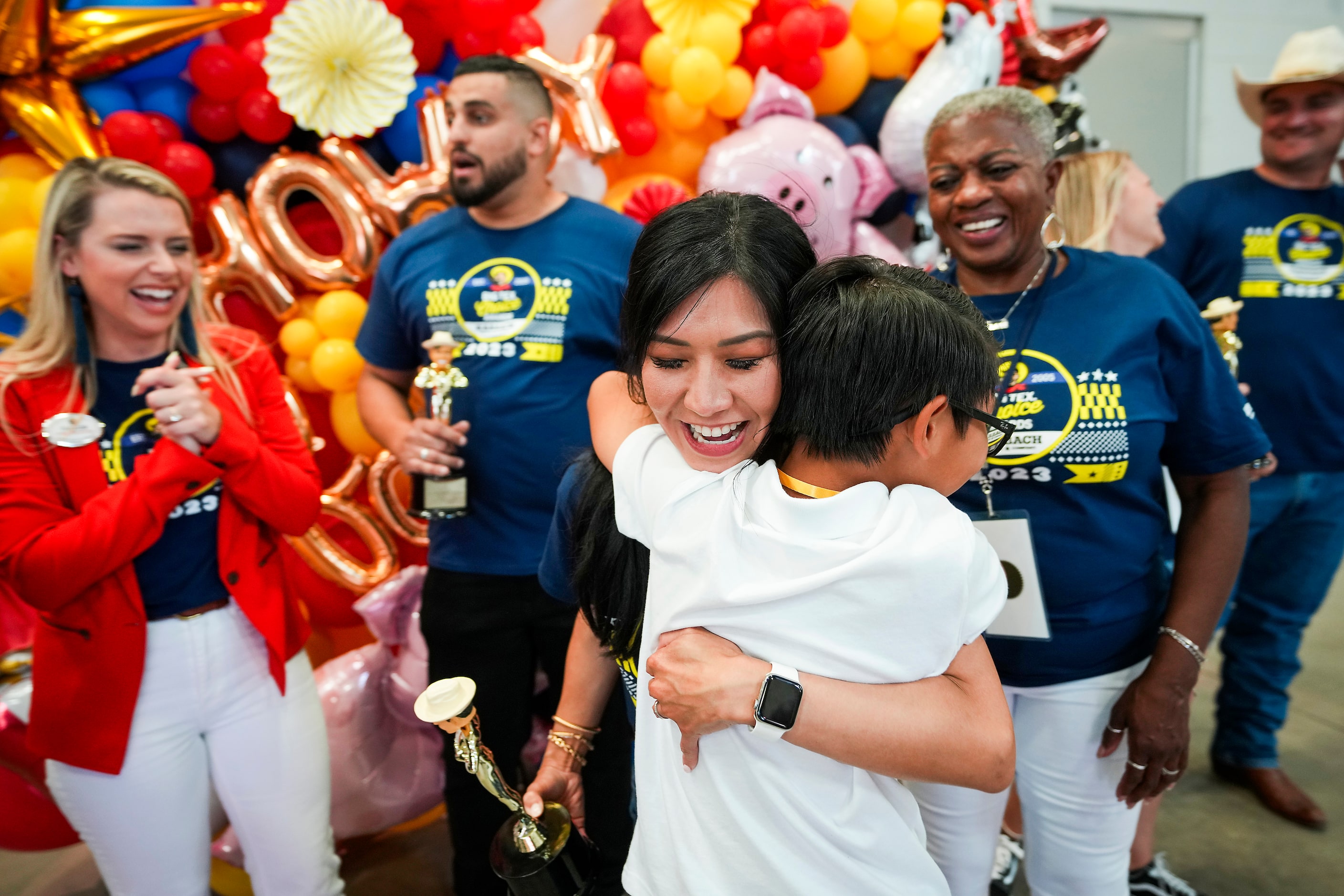 Michelle Le celebrates with her son Ethan, 11, after winning 'best taste - savory' for her...