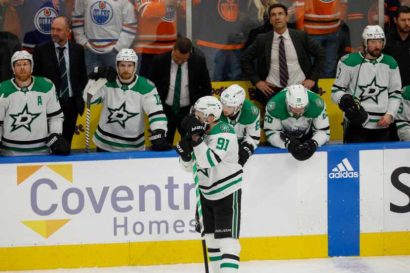 Dallas Stars center Tyler Seguin (91) holds his head after losing to the Edmonton Oilers in...
