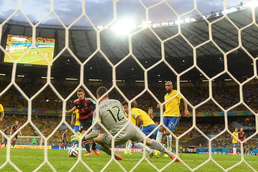 Miroslav Klose nets Germany's second goal in a 7-1 rout of Brazil on Tuesday. Germany will...