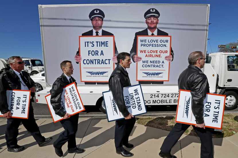 In this August 2019 photo, Southwest Airlines pilots wrapped up their picket in protest over...