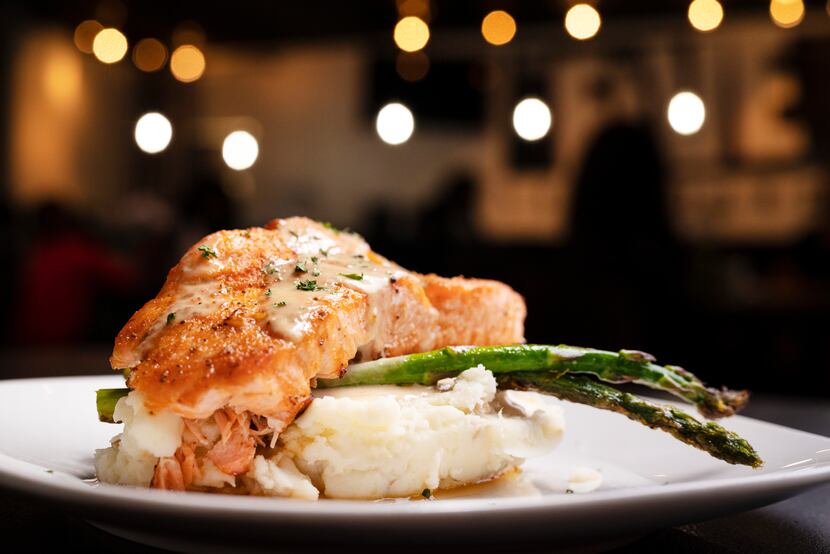 Creamed spinach stuffed salmon is one of the dishes on the menu at The Five Experience...