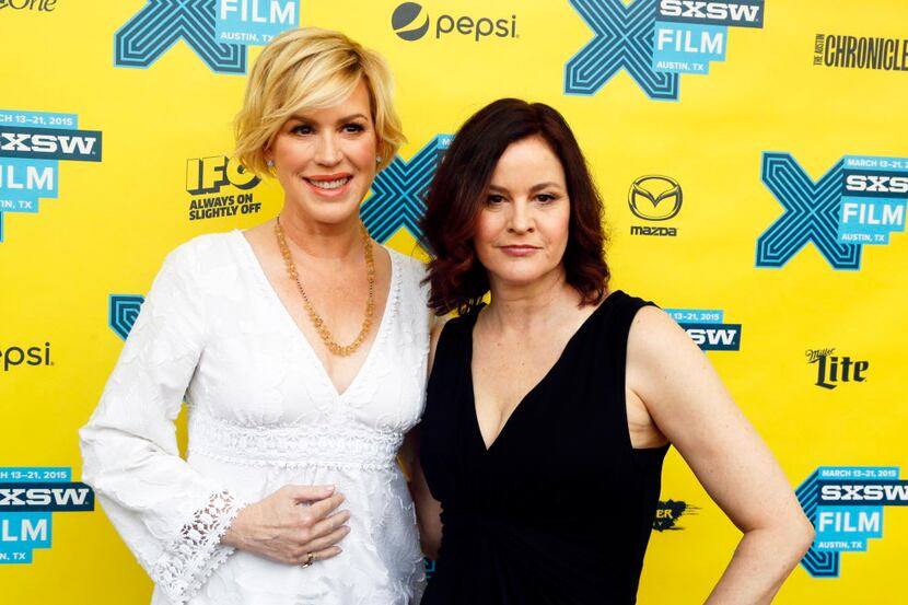 Molly Ringwald, left, and Ally Sheedy walk the red carpet for "The Breakfast Club" 30th...