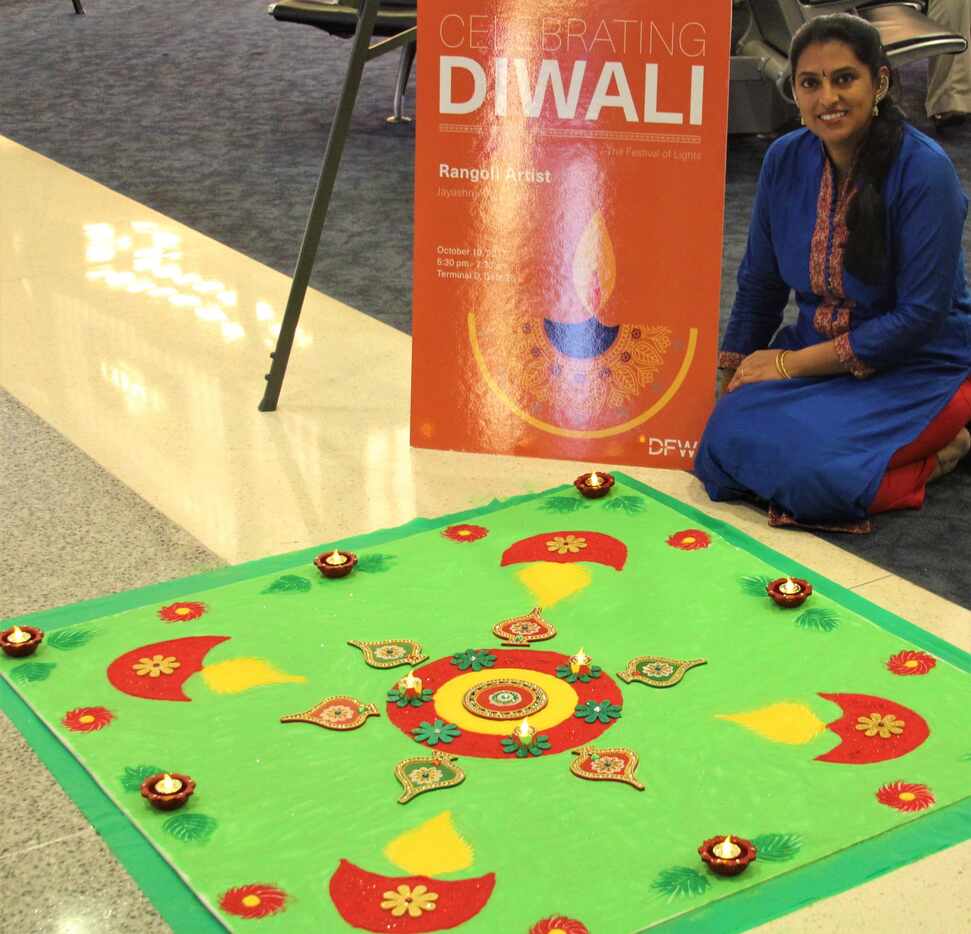 Jayashree Krishnan created a rangoli painting as part of a Diwali celebration Oct. 19 at DFW...