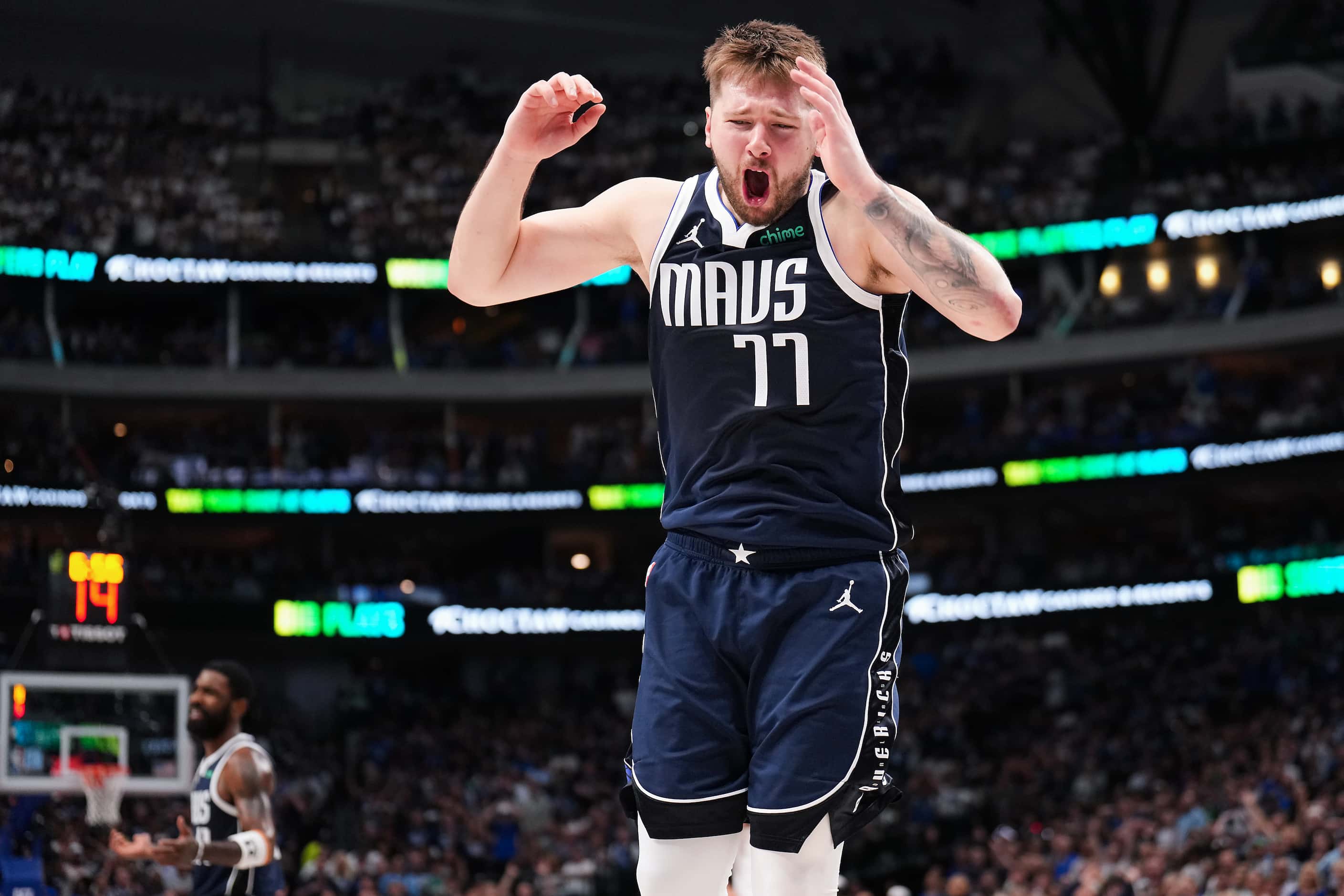 \Dallas Mavericks guard Luka Doncic (77) reacts after being called for a foul during the...