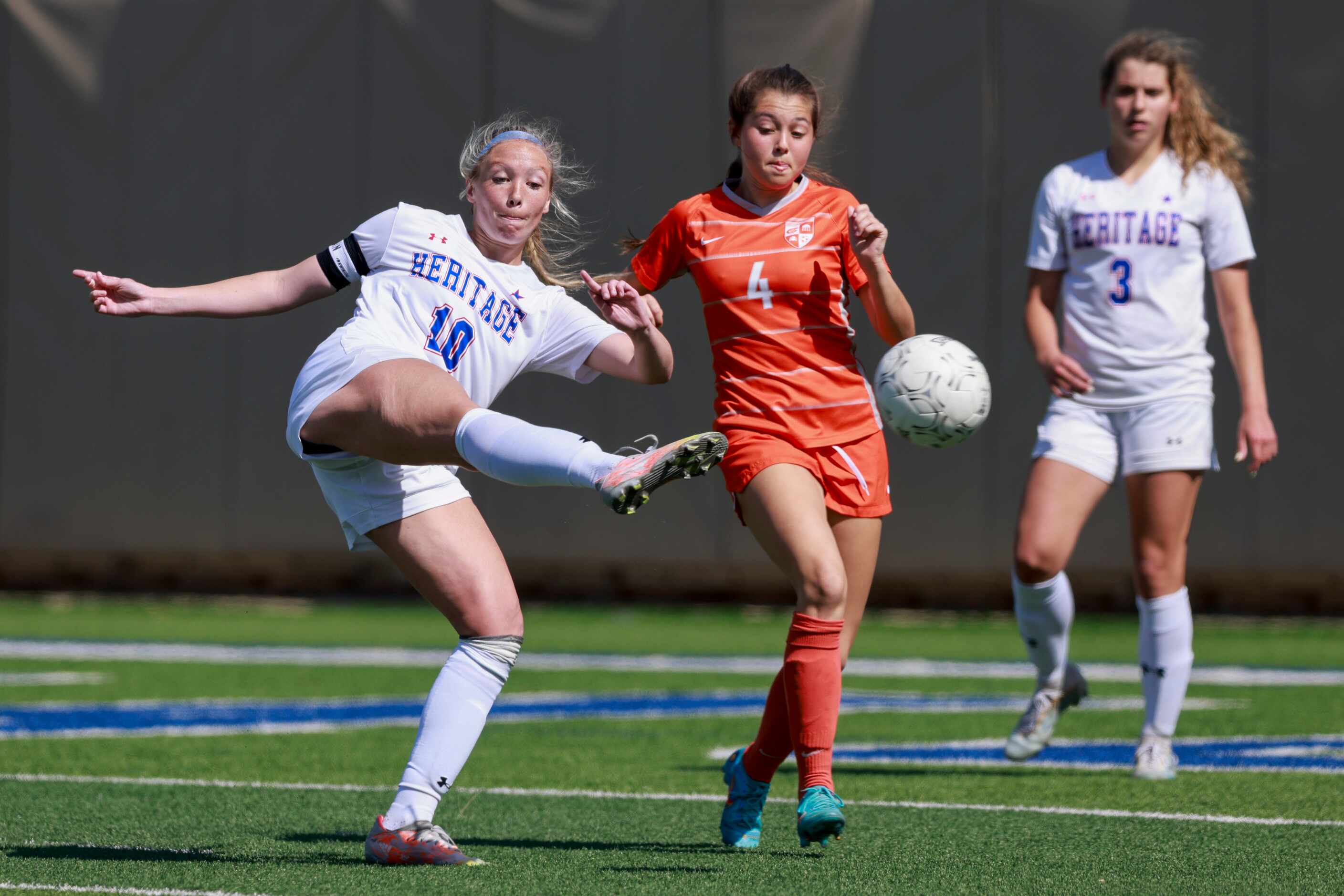 Midlothian Heritage midfielder Brynn Pollock (10) attempts a shot on goal during the second...
