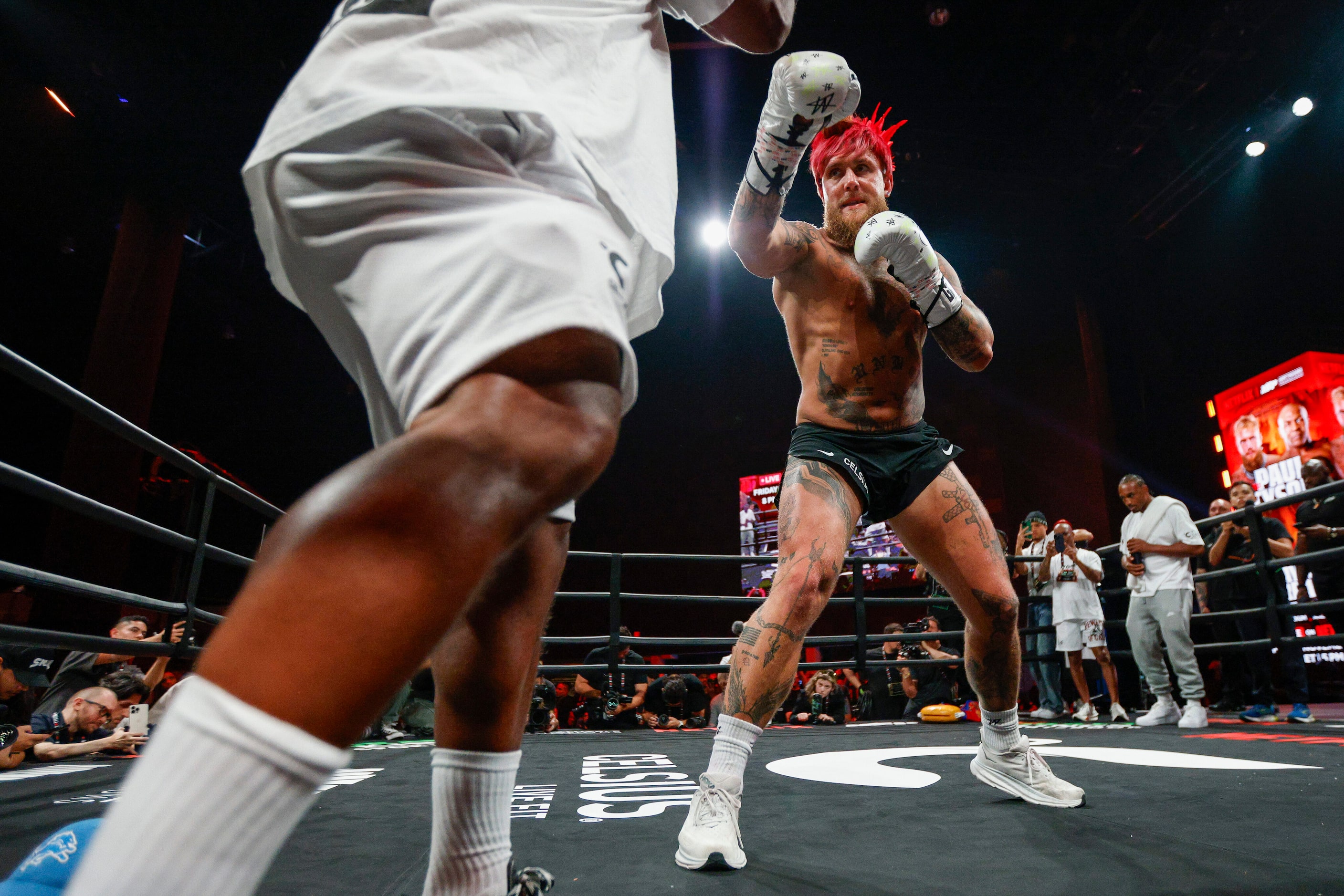 Jake Paul spars with a coach during an open workout ahead of his upcoming boxing bout...