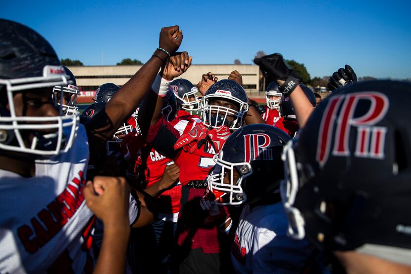 The John Paul II High School football team practices on Tuesday, December 3, 2019 in Plano....