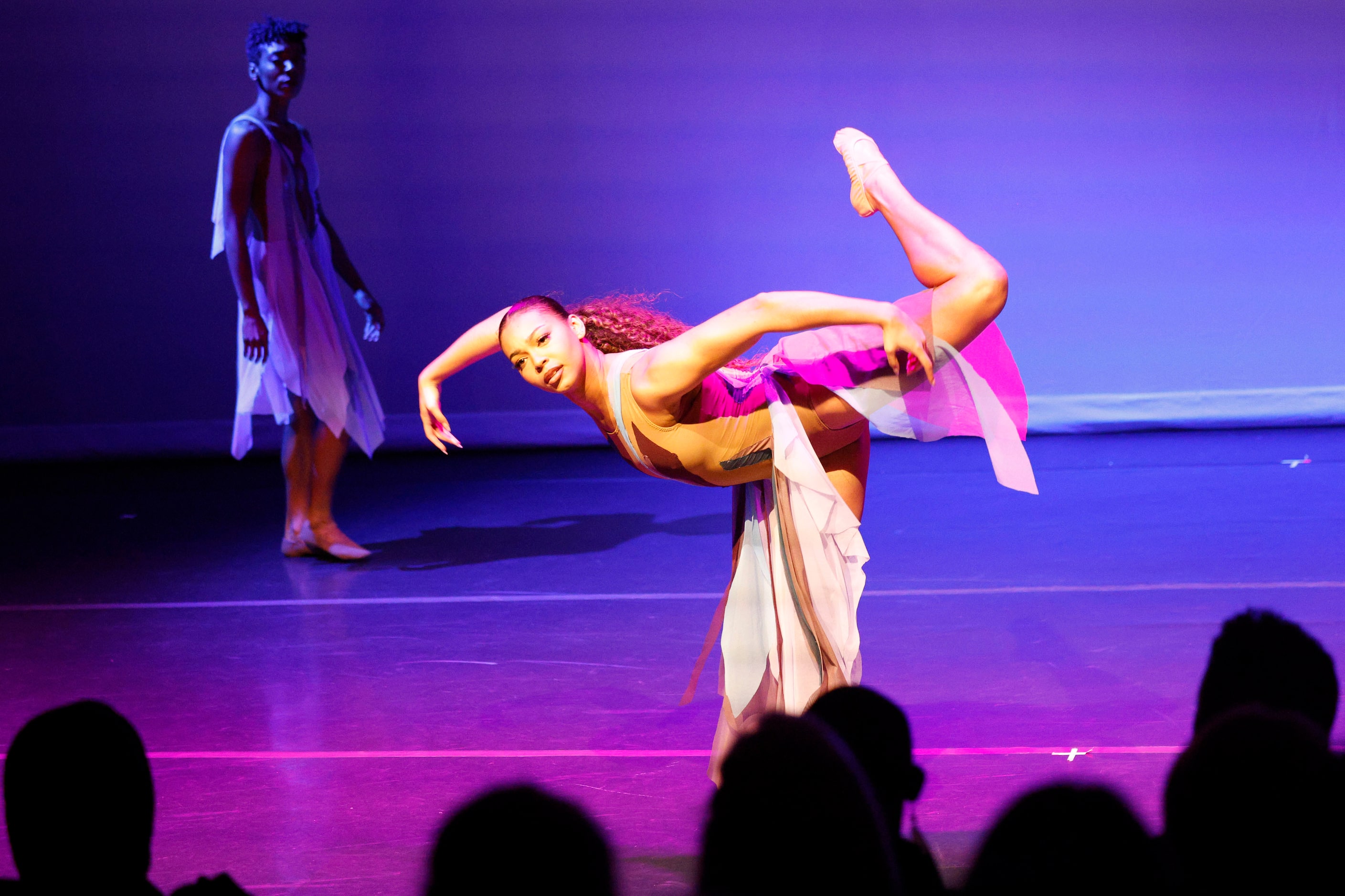 Former Dallas Black Dance Theatre dancers Sierra Noelle Jones, background and Gillian...