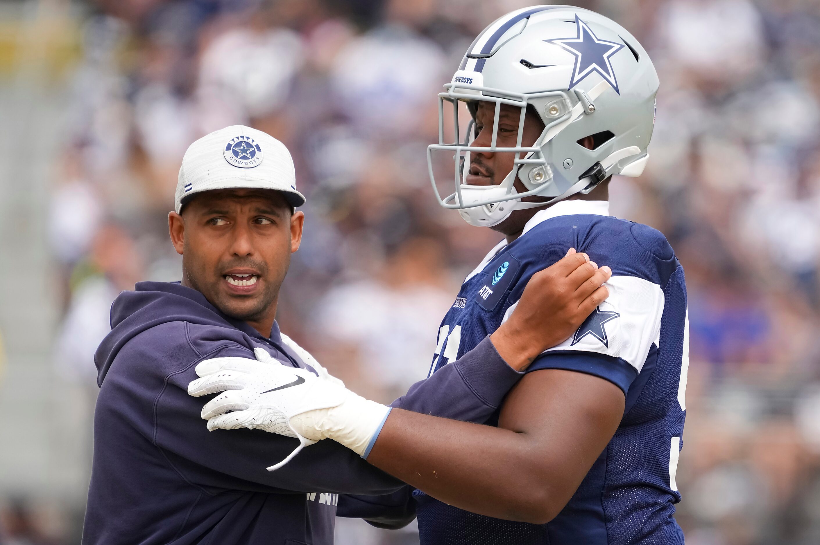 Dallas Cowboys defensive end Carlos Watkins (91) works with defensive line coach Aden Durde...