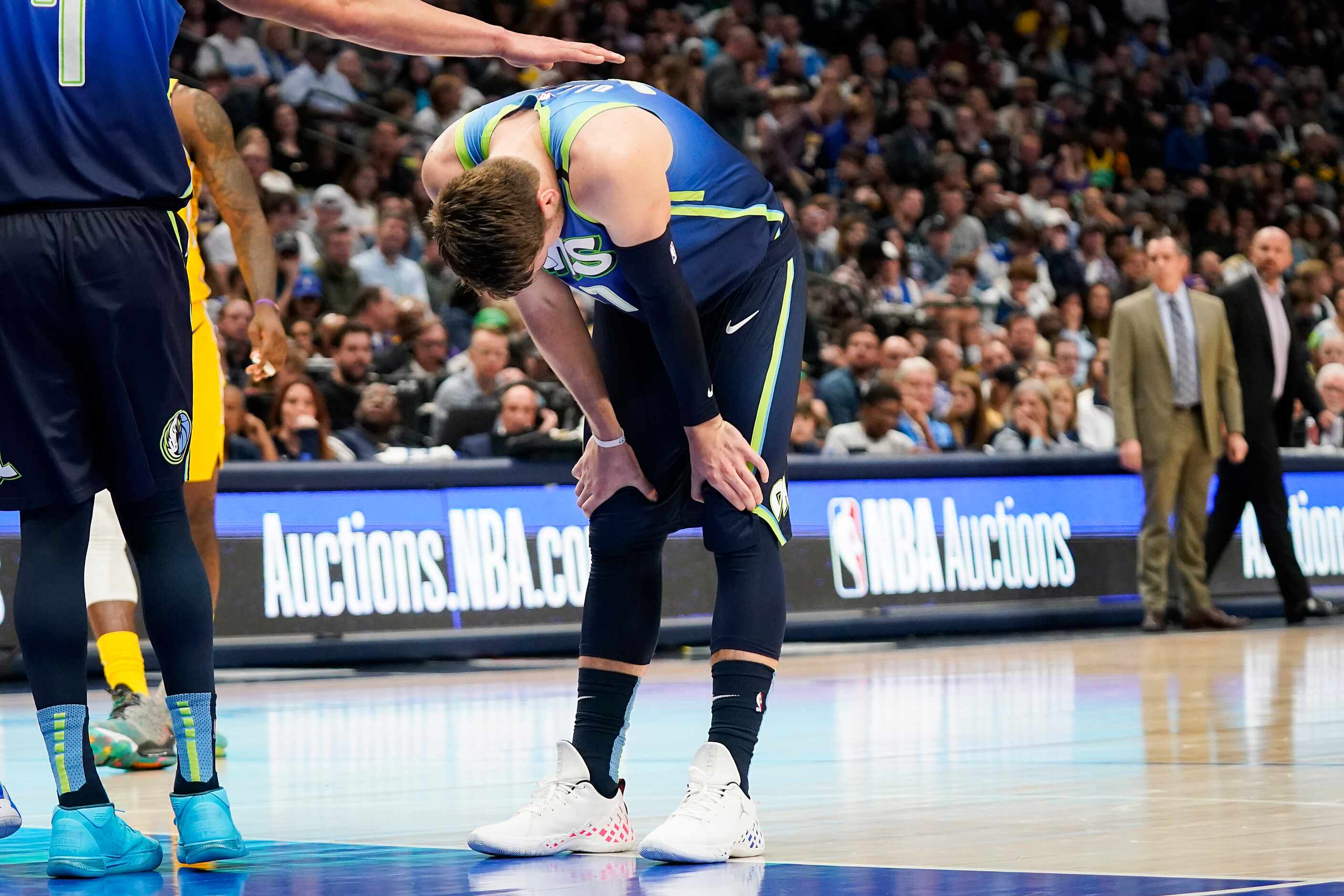 Dallas Mavericks guard Luka Doncic reacts after missing a free throw during the first half...
