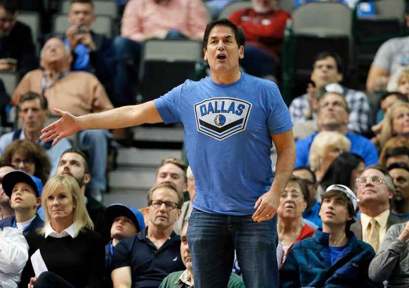 In this Dec. 14, 2015, file photo, Dallas Mavericks team owner Mark Cuban shouts in the...