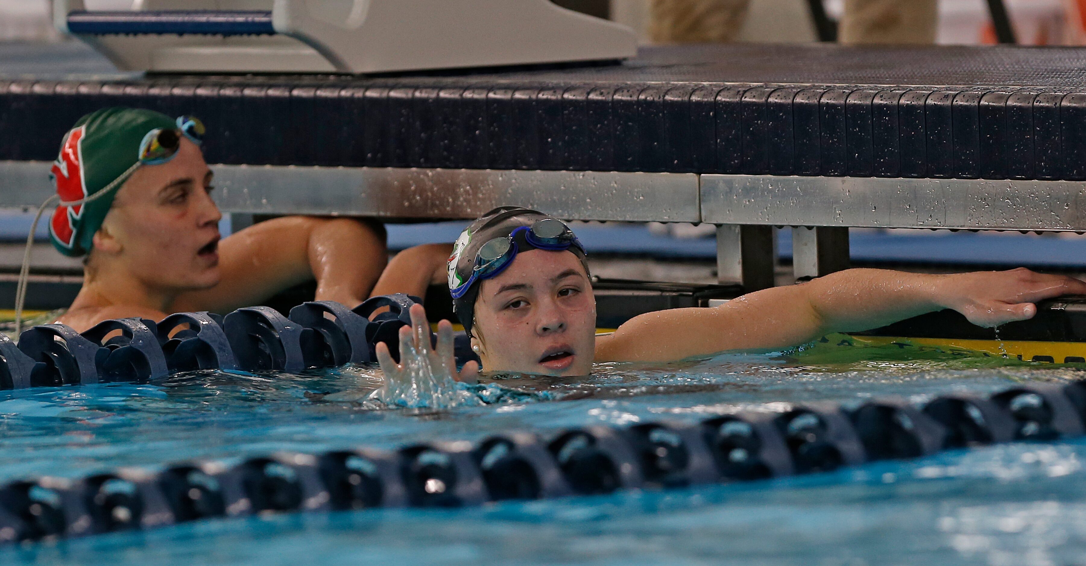 An exhausted Southlake Carroll Corbyn Cormack acknowledges sidelines after winning the 200...