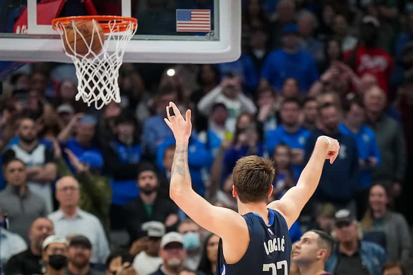 Dallas Mavericks guard Luka Doncic scores his 50th point of the game with a free throw...