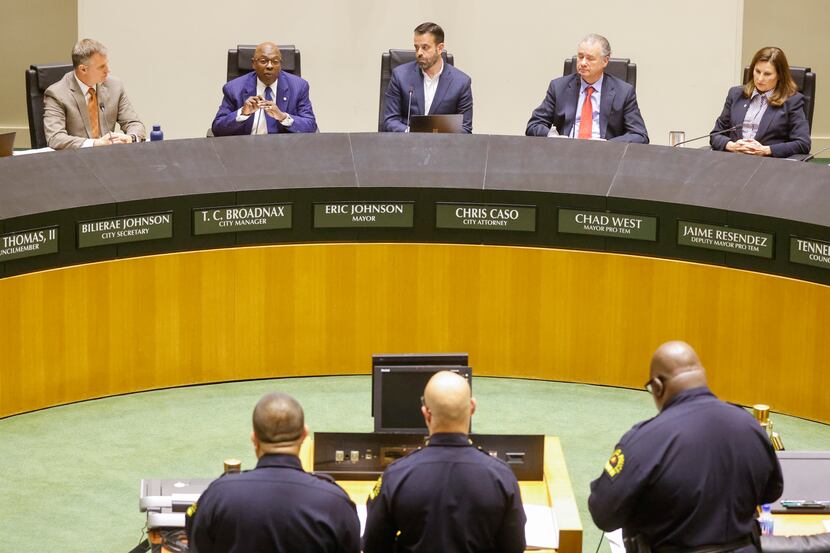 Dallas City Council members speak to Dallas police commanders during an April 11 meeting at...