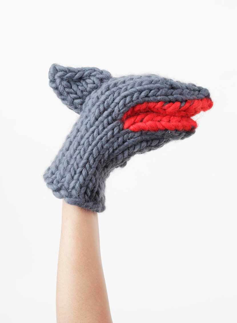 
Designers Wool and the Gang and Christopher Raeburn have turned their shark mittens into a...