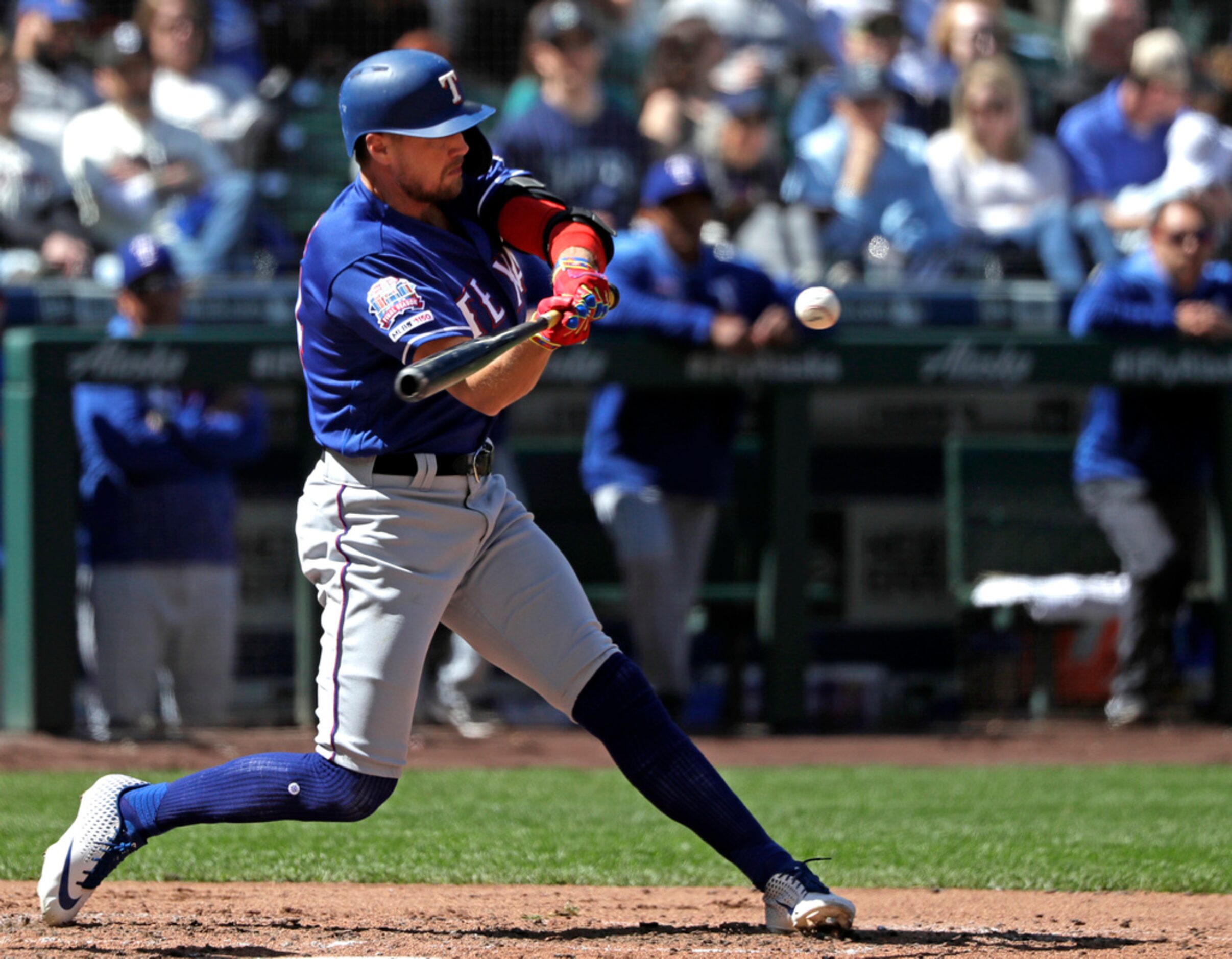 Texas Rangers' Hunter Pence doubles in a run against the Seattle Mariners in the fifth...