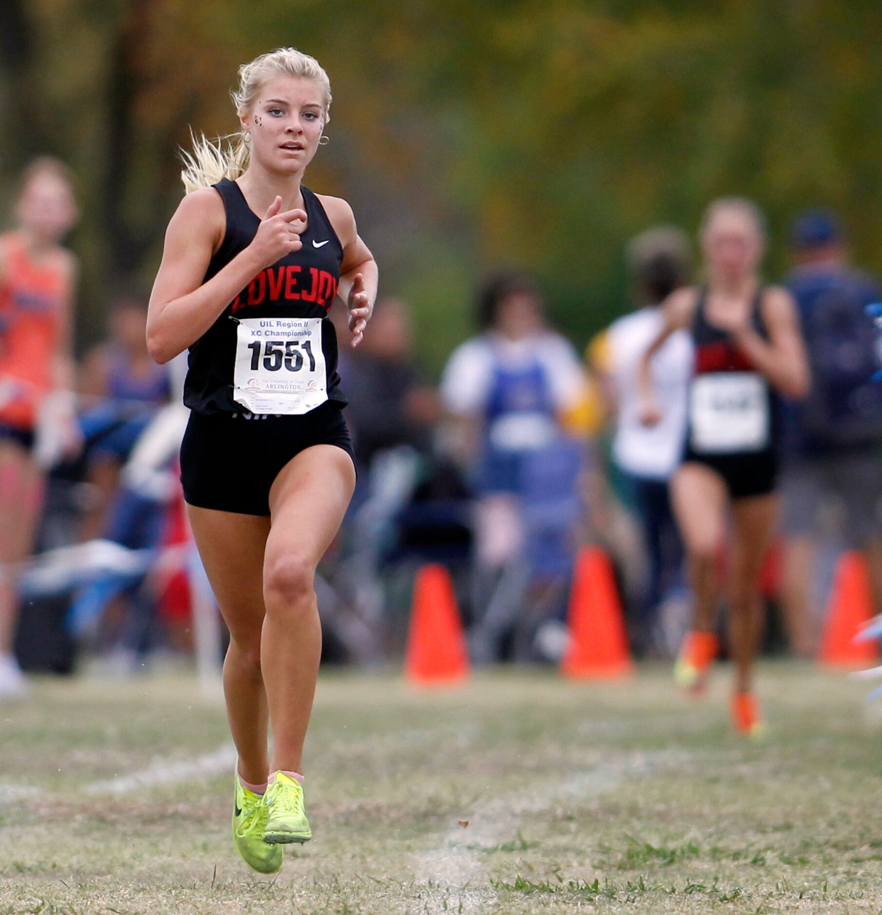 Lucas Lovejoy senior Sara Morefield (1551) races to the finish line with a winning time of...