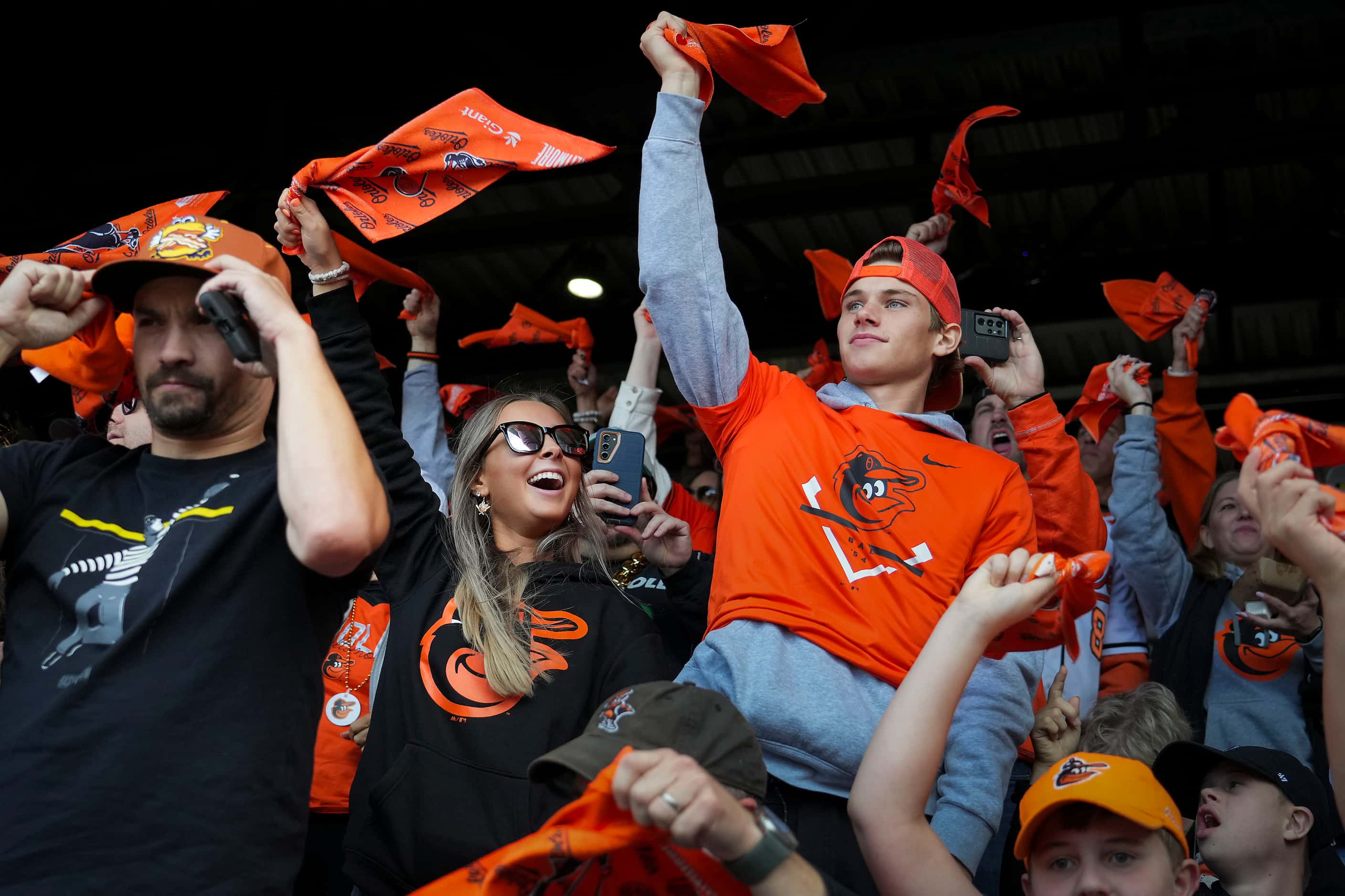 Baltimore Orioles fans cheer their team before Game 2 of an American League Divisional...