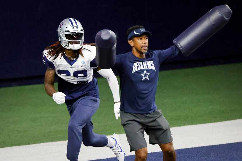 Dallas Cowboys wide receiver CeeDee Lamb (88) runs a pass route in the back of the end zone...