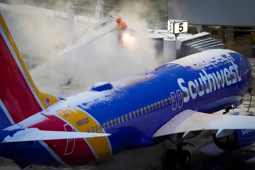 A worker sprayed deicing fluid on a Southwest Airlines plane at  Dallas Love Field  on Feb....