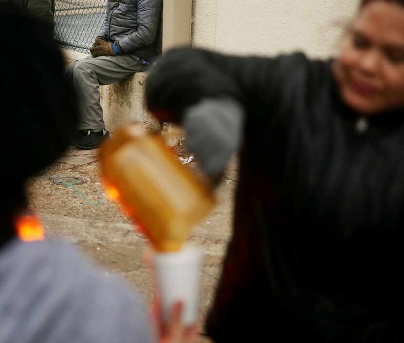 Members of the U.S. Christian Chaplain Association pass out coffee, sandwiches and water...